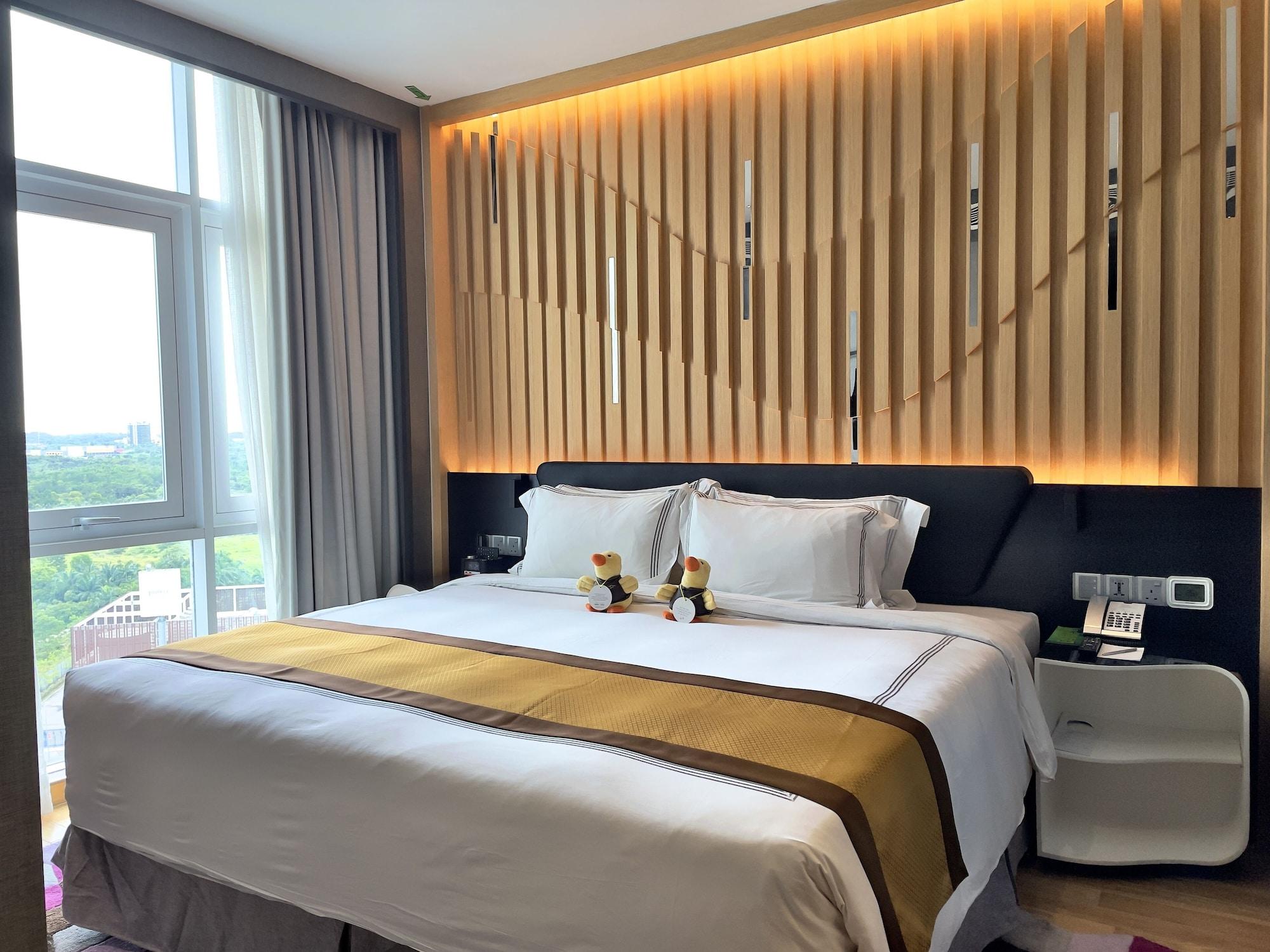 فندق فريزر بليس بوتري هاربر نوساجايا المظهر الخارجي الصورة A bedroom in a hotel
